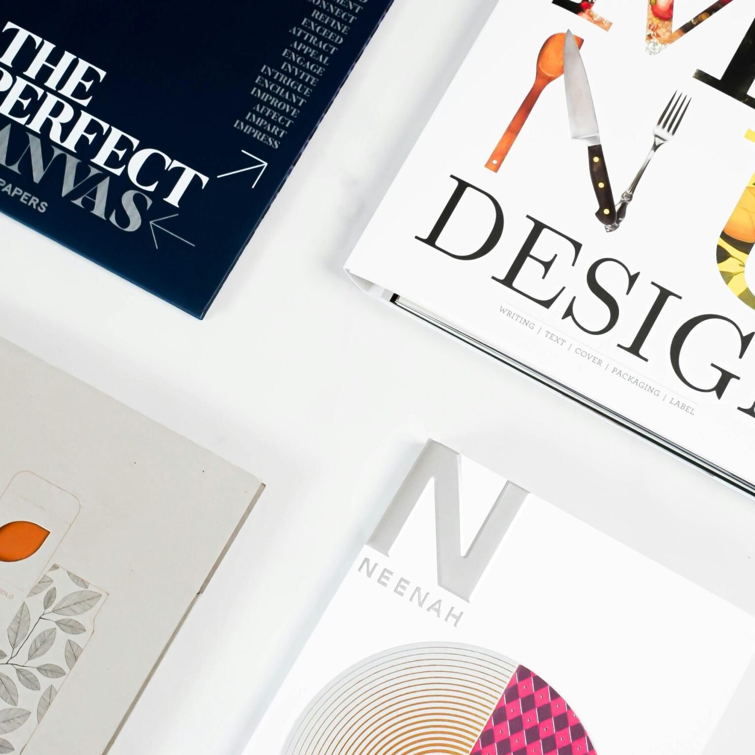 Modern brand identity design magazines showcasing typography layout and visual design concepts that align with RevampX approach to modern brand identity design.