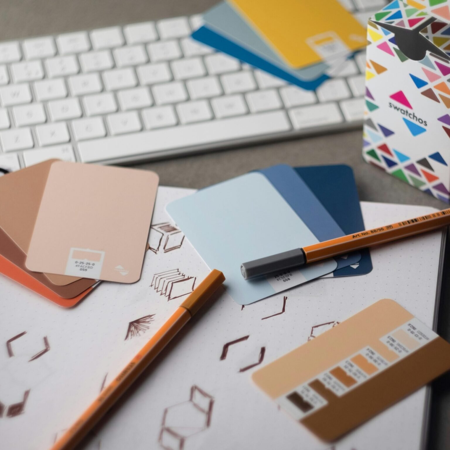 Color palette swatches and design sketches often used during RevampX brand identity development process.