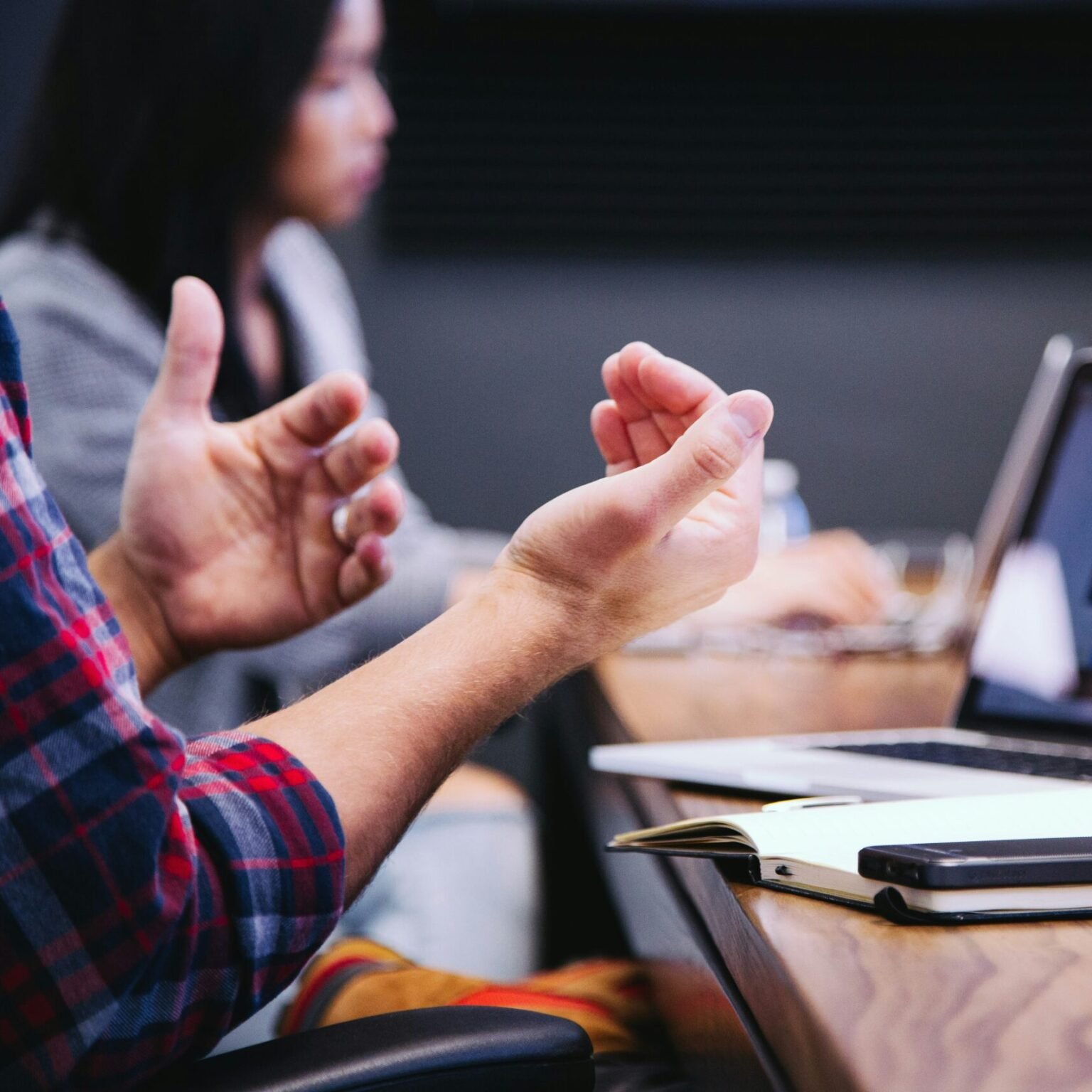 Team engaging in a collaborative strategy session aligning client goals through consulting services offered by RevampX.