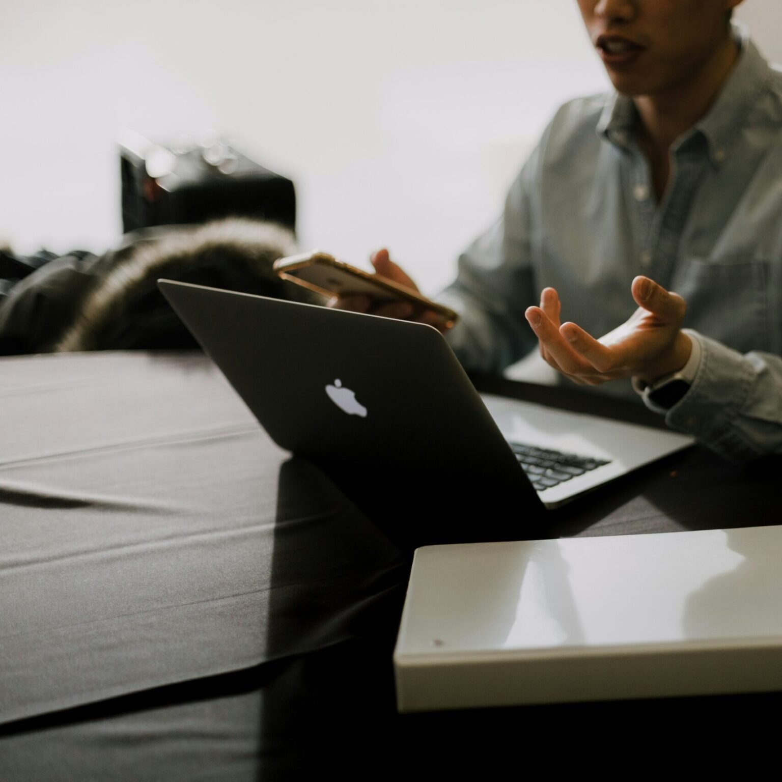 Business owner consulting on digital strategy solutions related to website maintenance and performance improvements with RevampX.